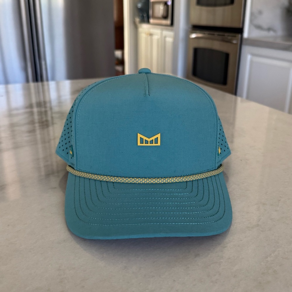 Melin Green Cap with Yellow Logo